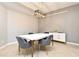 Dining room with modern light fixture, table, and decorative sideboard at 506 Harbor Winds Ct, Winter Springs, FL 32708