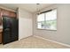 Kitchen nook featuring modern pendant lights, black appliances, and ample storage at 506 Harbor Winds Ct, Winter Springs, FL 32708