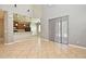 Open floor plan with tile flooring leading to kitchen at 506 Harbor Winds Ct, Winter Springs, FL 32708