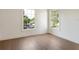 Bright and airy bedroom featuring natural light and wood flooring at 541 W Canton Ave, Winter Park, FL 32789