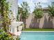 Elegant fountain detail adds a touch of sophistication to the backyard pool area at 541 W Canton Ave, Winter Park, FL 32789