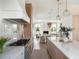 Gourmet kitchen with white countertops, brass accents, and open layout flowing into the living area at 541 W Canton Ave, Winter Park, FL 32789
