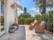 Cozy patio area with cushioned wicker chairs and ample seating for outdoor enjoyment at 541 W Canton Ave, Winter Park, FL 32789