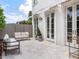 Outdoor living area features patio seating, manicured landscaping, and multiple access points at 541 W Canton Ave, Winter Park, FL 32789
