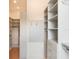 Organized walk-in closet with built-in shelving and ample storage space at 541 W Canton Ave, Winter Park, FL 32789