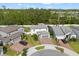Aerial shot of a two-story house with a gray roof, and surrounding neighborhood at 5458 Carrara Ct, St Cloud, FL 34771