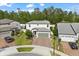 Charming two-story home features a well-manicured lawn, brick driveway, and a two-car garage at 5458 Carrara Ct, St Cloud, FL 34771