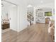 Bright foyer showcases hardwood flooring and an open floor plan leading to the living spaces at 5458 Carrara Ct, St Cloud, FL 34771