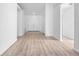 Spacious living room featuring wood-look flooring and a bright, open feel at 6042 Brookhill Cir, Orlando, FL 32810
