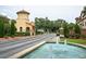 Gated entrance with beautiful fountain and landscaping leading to luxury homes within a private community at 625 Pavia Loop, Lake Mary, FL 32746