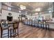 Inviting bar area featuring stylish seating, modern lighting, and a relaxing atmosphere for socializing and entertainment at 636 San Augusto Dr, Kissimmee, FL 34759