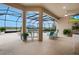Spacious outdoor patio with comfortable seating, pool view, and screened enclosure at 636 San Augusto Dr, Kissimmee, FL 34759