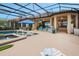 Pool area with ample deck space and outdoor seating, perfect for entertaining at 636 San Augusto Dr, Kissimmee, FL 34759