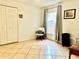 Bright office space with closet, chair, and window providing ample natural light at 6704 Westlake Blvd, Orlando, FL 32810