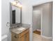 Bathroom featuring granite countertop vanity at 6728 Duncaster St, Windermere, FL 34786