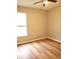 Bedroom with laminate floors, natural light and neutral wall paint at 6728 Duncaster St, Windermere, FL 34786
