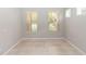 Neutral empty room features windows for natural light, and neutral tile flooring at 6728 Duncaster St, Windermere, FL 34786