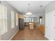 Open kitchen featuring stainless steel appliances, an island, and ample cabinet space at 6728 Duncaster St, Windermere, FL 34786