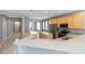 A gourmet kitchen features modern appliances, tile floors, island and a breakfast bar at 6728 Duncaster St, Windermere, FL 34786