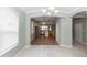 Open living area leads into a spacious kitchen, perfect for entertaining guests at 6728 Duncaster St, Windermere, FL 34786