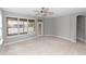 The living room offers large windows for natural light and easy access to the patio at 6728 Duncaster St, Windermere, FL 34786