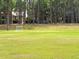 Community soccer field and open space providing a beautiful park-like setting to nearby homes at 6728 Duncaster St, Windermere, FL 34786