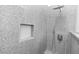 Shower stall features rainfall shower head and tiled accent at 6728 Duncaster St, Windermere, FL 34786