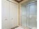 Enclosed shower with glass sliding door at 721 Fairway Dr, New Smyrna Beach, FL 32168