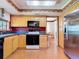 Well-equipped kitchen with modern appliances and ample storage at 721 Fairway Dr, New Smyrna Beach, FL 32168