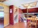 Kitchen view leading to stairs, a cozy living space, and other living area at 721 Fairway Dr, New Smyrna Beach, FL 32168