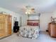 Comfortable bedroom featuring neutral tones and a full set of wooden furniture at 721 Fairway Dr, New Smyrna Beach, FL 32168