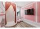 Themed bedroom with curtains, mounted TV, and decorative wall accents at 8180 Valhalla Ter, Reunion, FL 34747