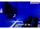 A cozy game room featuring comfortable seating, a large screen TV, and gaming consoles for immersive experiences at 8180 Valhalla Ter, Reunion, FL 34747