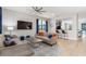 Bright living room featuring neutral walls and easy access to the pool at 8180 Valhalla Ter, Reunion, FL 34747