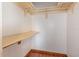 Simple walk-in closet with shelf and rod, offering storage space at 916 Glendale St, Orlando, FL 32807