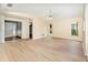 Bright living room with wood flooring and natural light from the windows at 916 Glendale St, Orlando, FL 32807