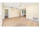 Spacious living room featuring sleek flooring, neutral walls, and a ceiling fan at 916 Glendale St, Orlando, FL 32807