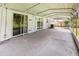 Spacious covered patio, ideal for outdoor entertaining and enjoying the backyard view at 916 Glendale St, Orlando, FL 32807