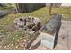 The backyard has a stone fire pit and seating area at 2527 Christine Dr, Kissimmee, FL 34744