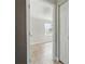 Open doorway to a bedroom with tile floors, a window, and a closet at 2527 Christine Dr, Kissimmee, FL 34744