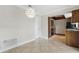 Dining area with tile floors and pendant lighting adjacent to the kitchen at 2527 Christine Dr, Kissimmee, FL 34744