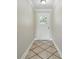 Bright entryway with tile flooring leading into the home, creating a welcoming entrance at 2527 Christine Dr, Kissimmee, FL 34744