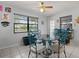 Charming dining area with unique table, stylish chairs and natural light at 1007 3Rd St, Port Orange, FL 32129