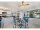 Bright kitchen features white cabinets, stainless steel appliances, and a quaint dining area with lots of natural light at 1007 3Rd St, Port Orange, FL 32129