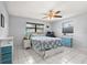 Serene bedroom featuring a comfortable bed, natural light, and a soothing color scheme for restful relaxation at 1007 3Rd St, Port Orange, FL 32129