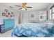 Tranquil bedroom offering a cozy bed, a dresser, and a soothing ambiance for restful nights and peaceful mornings at 1007 3Rd St, Port Orange, FL 32129