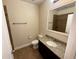 Bathroom features granite vanity, toilet, and shower with tile surround at 10631 Village Lake Rd, Windermere, FL 34786