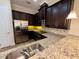 Modern kitchen boasts stainless appliances, granite countertops, and tile backsplash at 10631 Village Lake Rd, Windermere, FL 34786