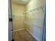 Well-organized walk-in closet featuring multiple shelves for optimal storage and organization at 10631 Village Lake Rd, Windermere, FL 34786