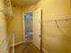 Spacious walk-in closet with shelving, providing ample storage space for clothing and accessories at 10631 Village Lake Rd, Windermere, FL 34786